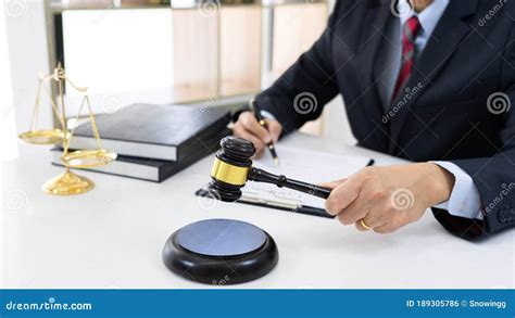 Professional Secretary Lawyer Working At His Office Signing Contract