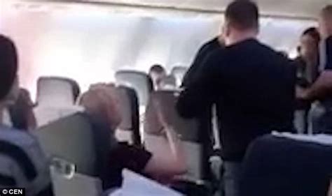 Airline Passenger Punches Drunk Man In The Face After He Threatened To