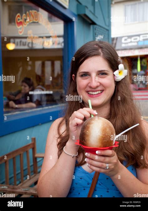 A Pretty Brunette Girl Enjoys A Hawaiian Shave Ice Shaved Ice From Scandinavian Shave Ice In