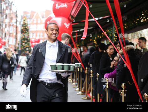Editorial Use Only Harrods Butler Kofi Gay Entertains Shoppers As They Queue Outside The Store