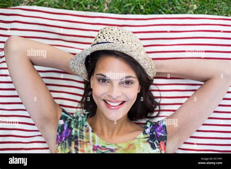 Smiling Beautiful Brunette Lying On The Blanket Stock Photo Alamy