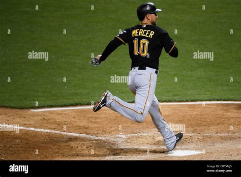 Pittsburgh Pirates Jordy Mercer Scores On A Passed Ball By Cincinnati