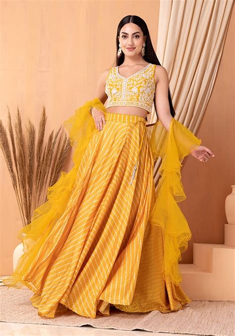 Buy Women Yellow Bandhani Print Lehenga Set With Embroidered Blouse And