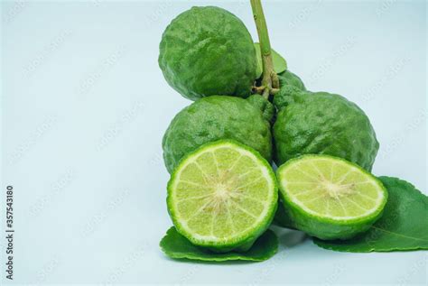 Fresh bergamot fruit with leaf and cut in half of bergamot on white ...