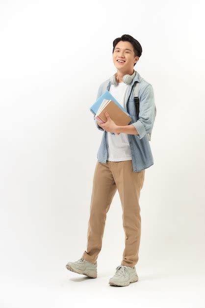 Premium Photo Young Happy Student Carrying Books