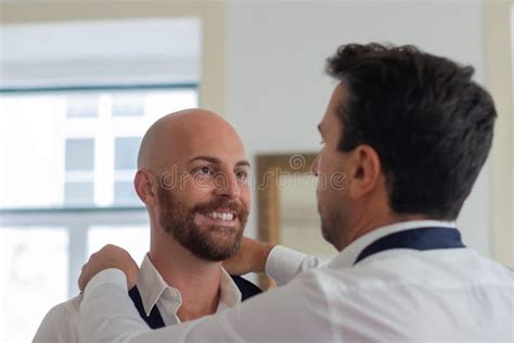 Gay Tying Partners Tie At Home For Wedding Ceremony Stock Photo Image Of Male Relationship