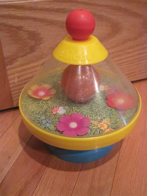 Vintage Chicco Spinning Bee Flowers Bell Toy Yellow Orange And Blue