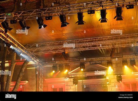 Colourful Spotlights Hanging On A Rig On A Batten Above Stage During A