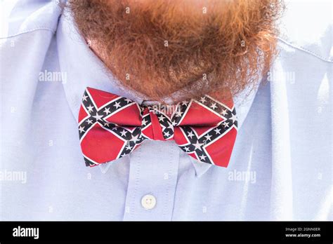 A Confederate Supporter Wears A Rebel Flag Bow Tie During A Memorial