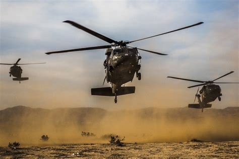 Air Assault! Three UH-60 Blackhawk helicopters, carrying the U.S. Army ...