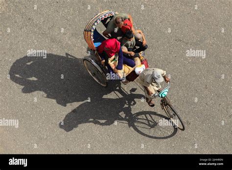 Dhaka Bangladesh Th July A Rickshaw Puller Carries