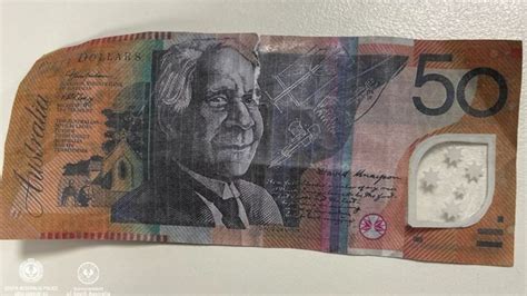 Royal Adelaide Show: Detail exposes fake $50 notes | The Courier Mail
