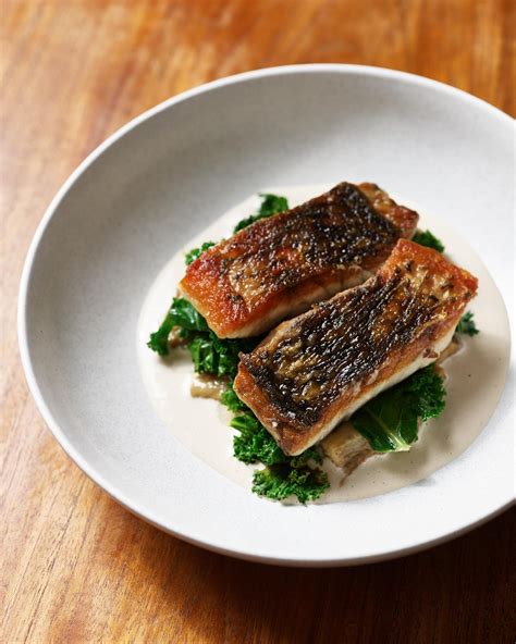 Pan Seared Barramundi With Tahini Miso Eggplant And Kale