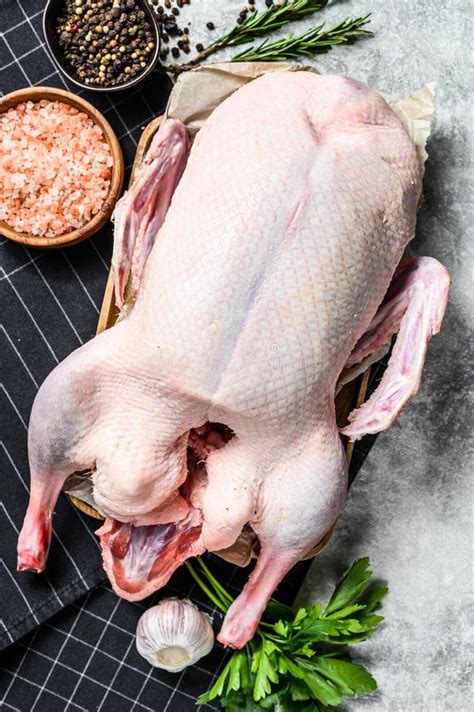 Whole Raw Goose Recipe For Cooking With Pink Salt Garlic Parsley And