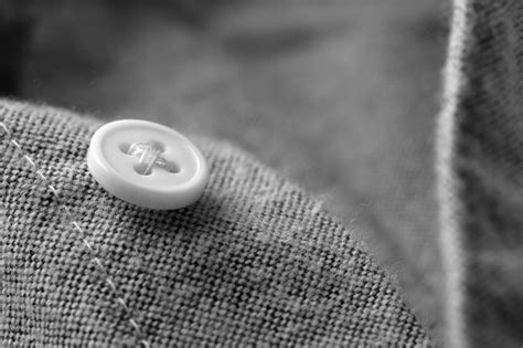 Premium Photo Button On Clothes Close Up