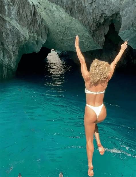 Pussycat Dolls Ashley Roberts Dives Into Blue Ocean While Wearing