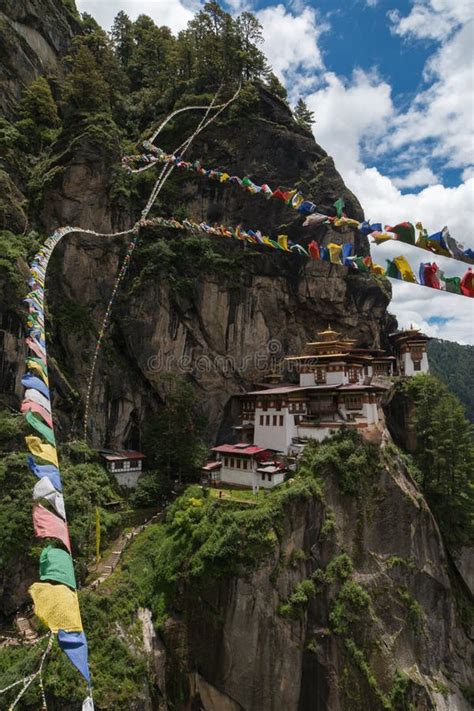 Taktsang Palphug Monastery With Prayer Flag Also Known As The Tiger