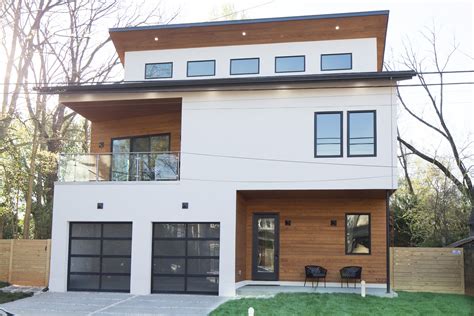 Modern Home Exterior With Black White And Wood Accents Charlotte North