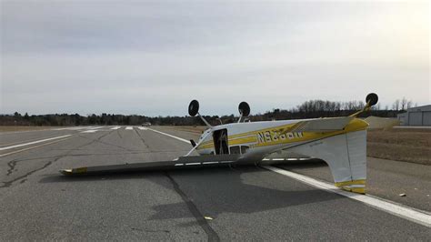 Small Plane Flips Over Due To Cross Wind