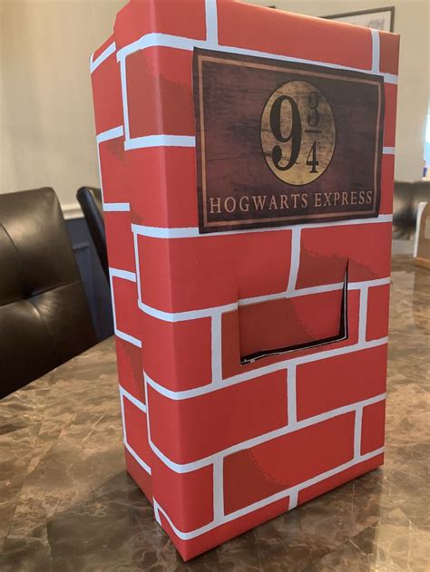 The Hogwarts Express Box Is Made Out Of Cardboard And Sits On A Table