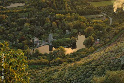 High View Of The Castle And Lake Of The Garden Of Ninfa In Cisterna Di