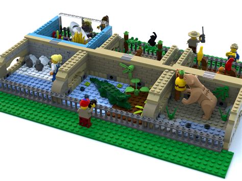 A Lego Model Of A Zoo With Animals And People In The Enclosure