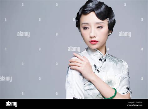 Young Beautiful Woman In Traditional Cheongsam Stock Photo Alamy