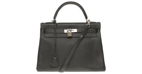 Splendide Sac à main Hermès Kelly retourné 32cm bandoulière en cuir