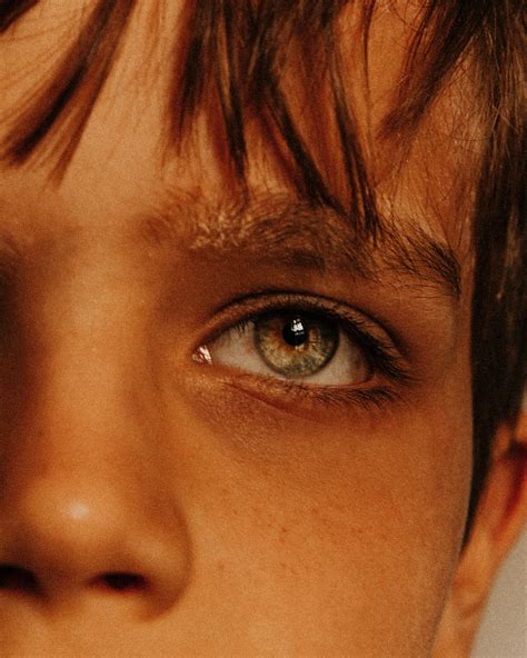 Crop pensive boy with gray green eyes · Free Stock Photo