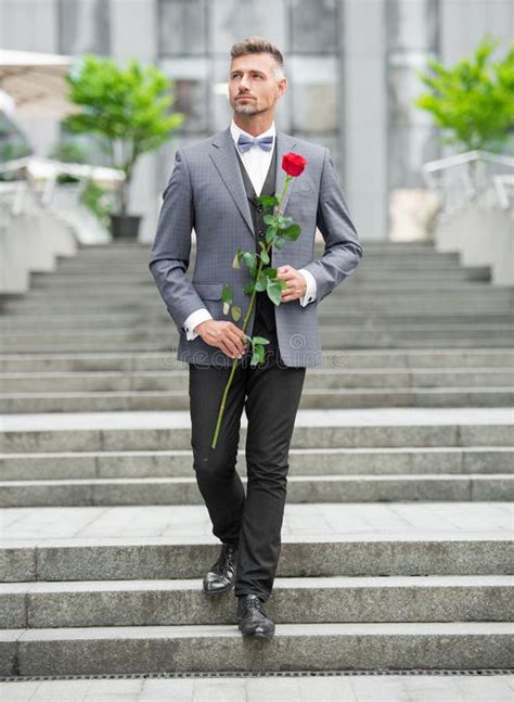 Elegant Man In Tux Man Wearing Tux Bowtie Walking Outdoor Stock Photo