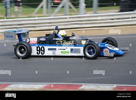 Blue Race Car On Race Track Stock Photo Alamy