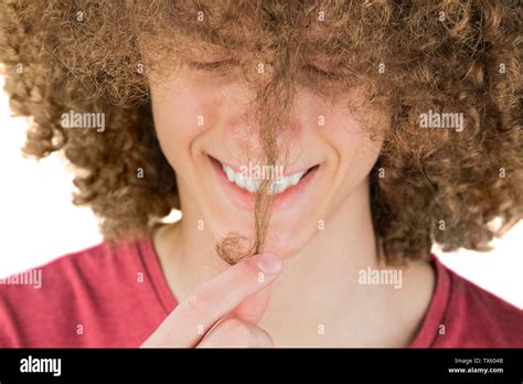 Portrait Young Curly European Man Joyfully Smiling Looks At His Long