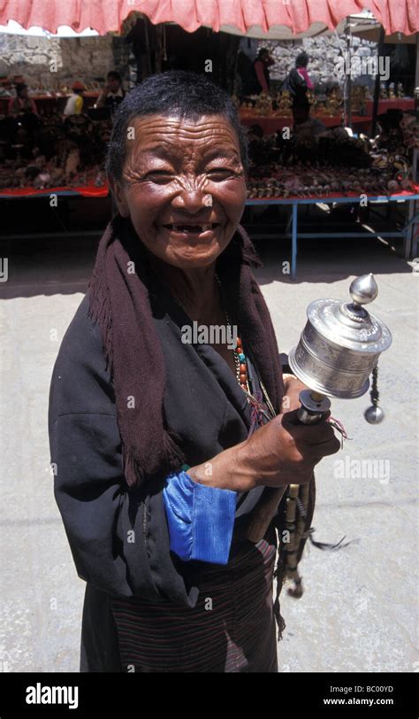 Grinning Tibetan Female Pilgrim Prayer Wheel Barkhor Circuit Lhasa