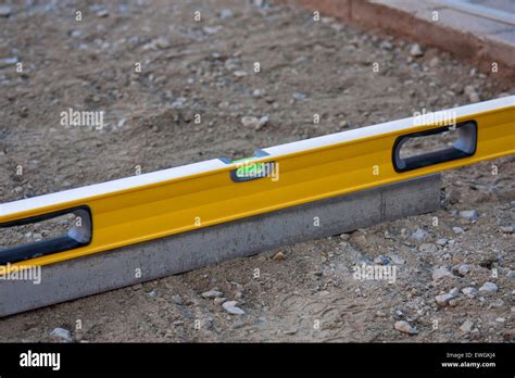 leveling the ground getting it ready for paving Stock Photo - Alamy