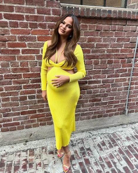 Exclusive Pregnant Chrissy Teigen Seen Flaunting Her Large Cleavage