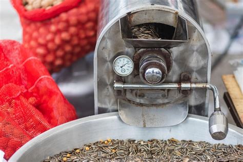 Premium Photo Close Up Of Automatic Sunflower Seeds Roasting Machine