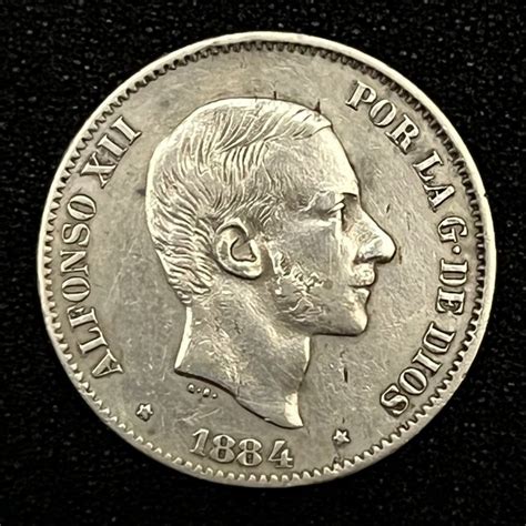 España Alfonso XII 1874 1885 50 Centimos de Peso 1884 Filipinas