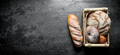 Premium Photo | Assortment of different types of bread in the basket