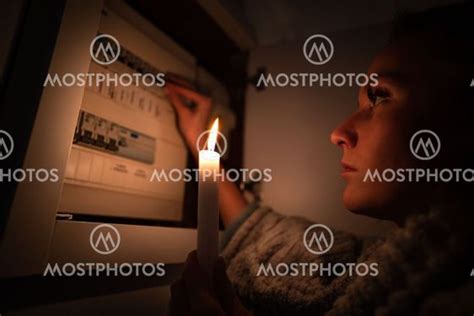 Woman Checking Fuse Box At Av Daria Kulkova Mostphotos