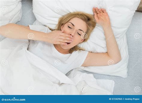 Woman Yawning In Bedroom Stock Image Image Of Flat Bedroom 57242965