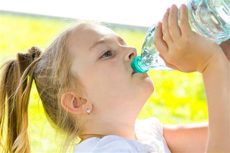 Cute Girl Drinking Water Stock Photo Download Image Now 6 7 Years