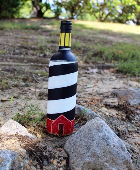 Lighthouse Hand Painted Wine Bottle By Afterthewinebymarlee On Etsy Lighthouse Bottle Wine W