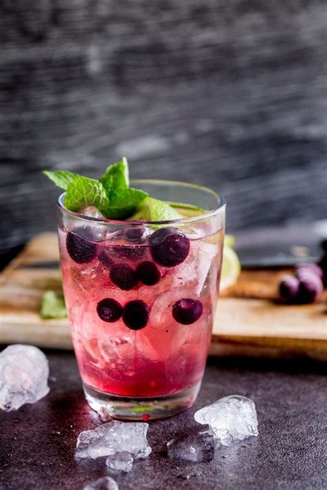 Gin And Tonic Muddled With Blueberry Lime And Mint Gin Recipes Gin