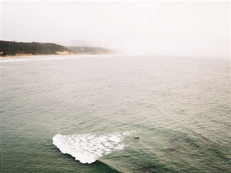 "Surfing Oregon Coast" by Stocksy Contributor "Branden Harvey Stories ...