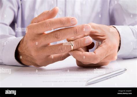 Remove Wedding Ring Suit Hi Res Stock Photography And Images Alamy