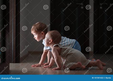 Two baby crawling race stock photo. Image of horizontal - 107301422