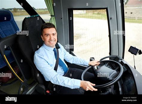 Happy Driver Driving Intercity Bus Stock Photo Alamy