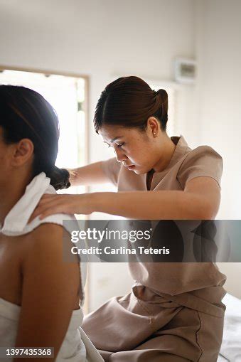 Massage Therapist Finishing Giving A Full Body Massage High Res Stock