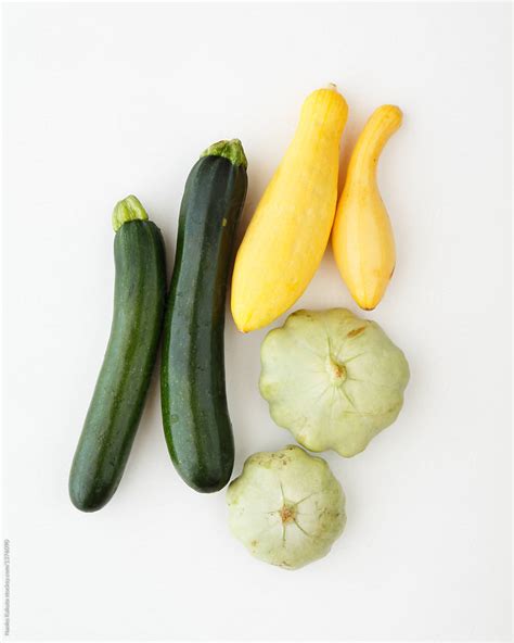 "Three Varieties Of Zucchini On White Background" by Stocksy Contributor "Naoko Kakuta" - Stocksy