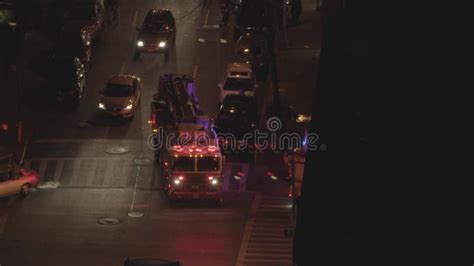 Fire Department Service Truck With Flashing Siren Lights At Night Stock